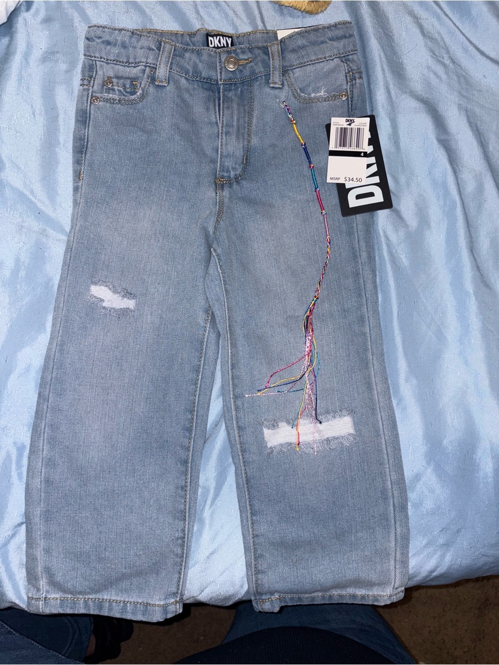 DKNY Light Blue Girls' Distressed Bootcut Jeans with Decorative Tassel